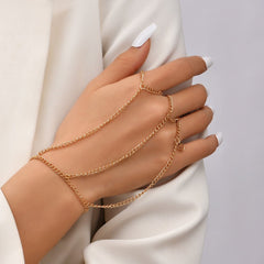 Pulsera con anillos y cadenas dorada - My Rebel Shop